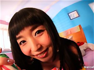 asian star Marica Hase plays with candy knob