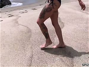 Anna Bell Peaks tearing up a ginormous penis on the beach